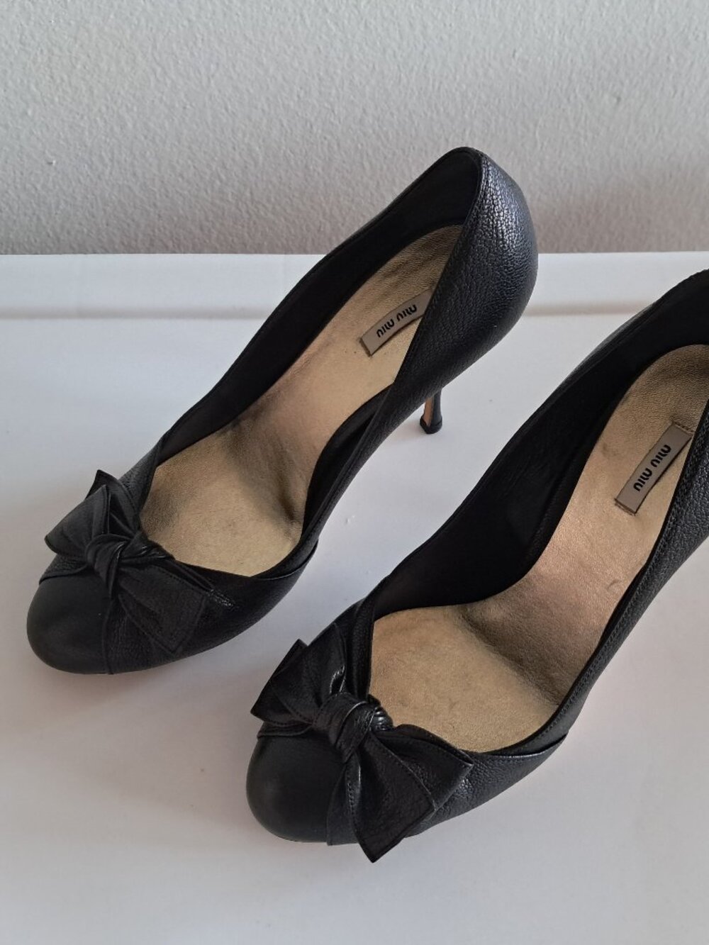 Miu Miu black leather high heels pumps, front bow knot, like new